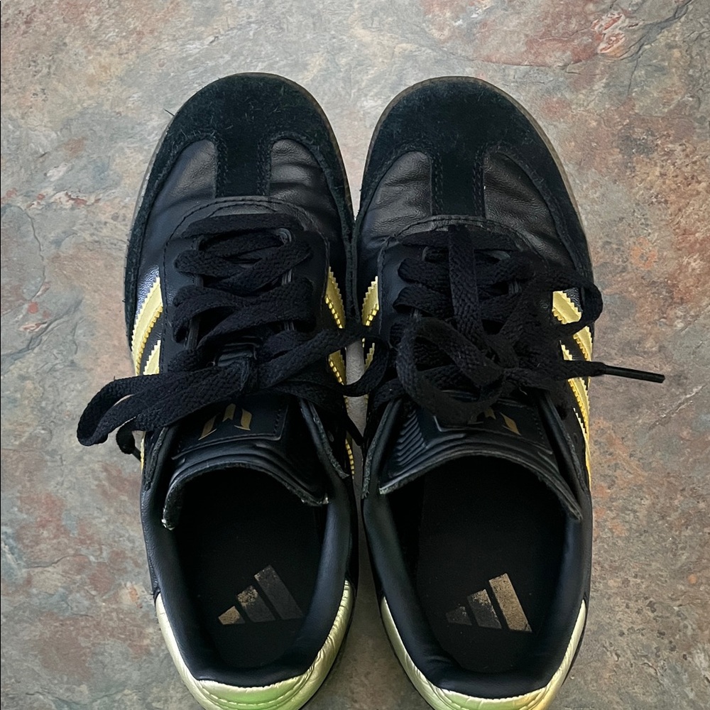 adidas Black Sneakers with Gold Three-Stripe Accents